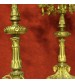 Pair of Italian candlesticks in gilt brass