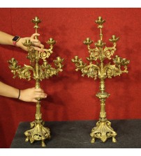 Pair of Italian candlesticks in gilt brass